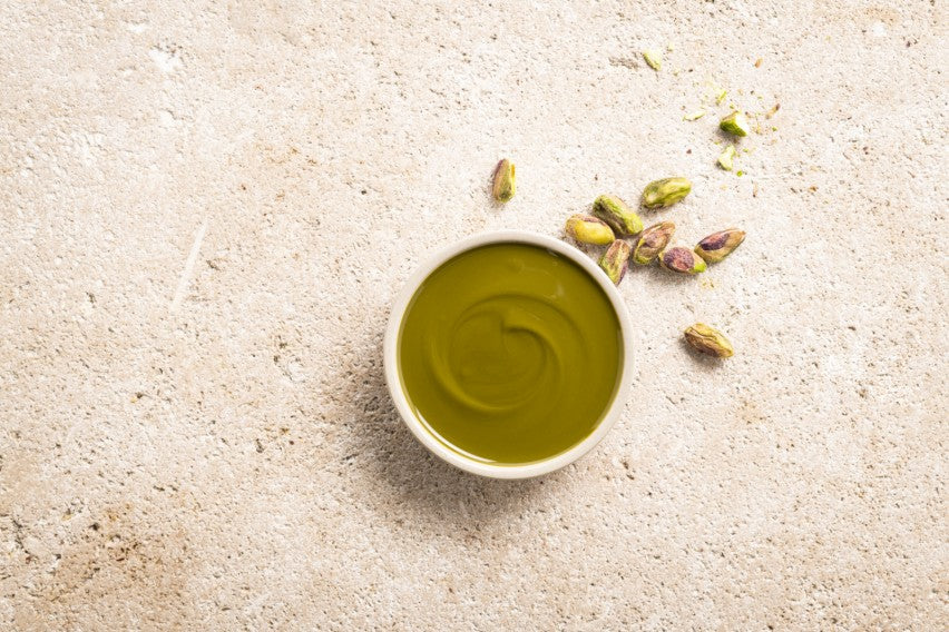 Barry Callebaut Pistachio Praline Paste 6/7lb cans (42lbs)